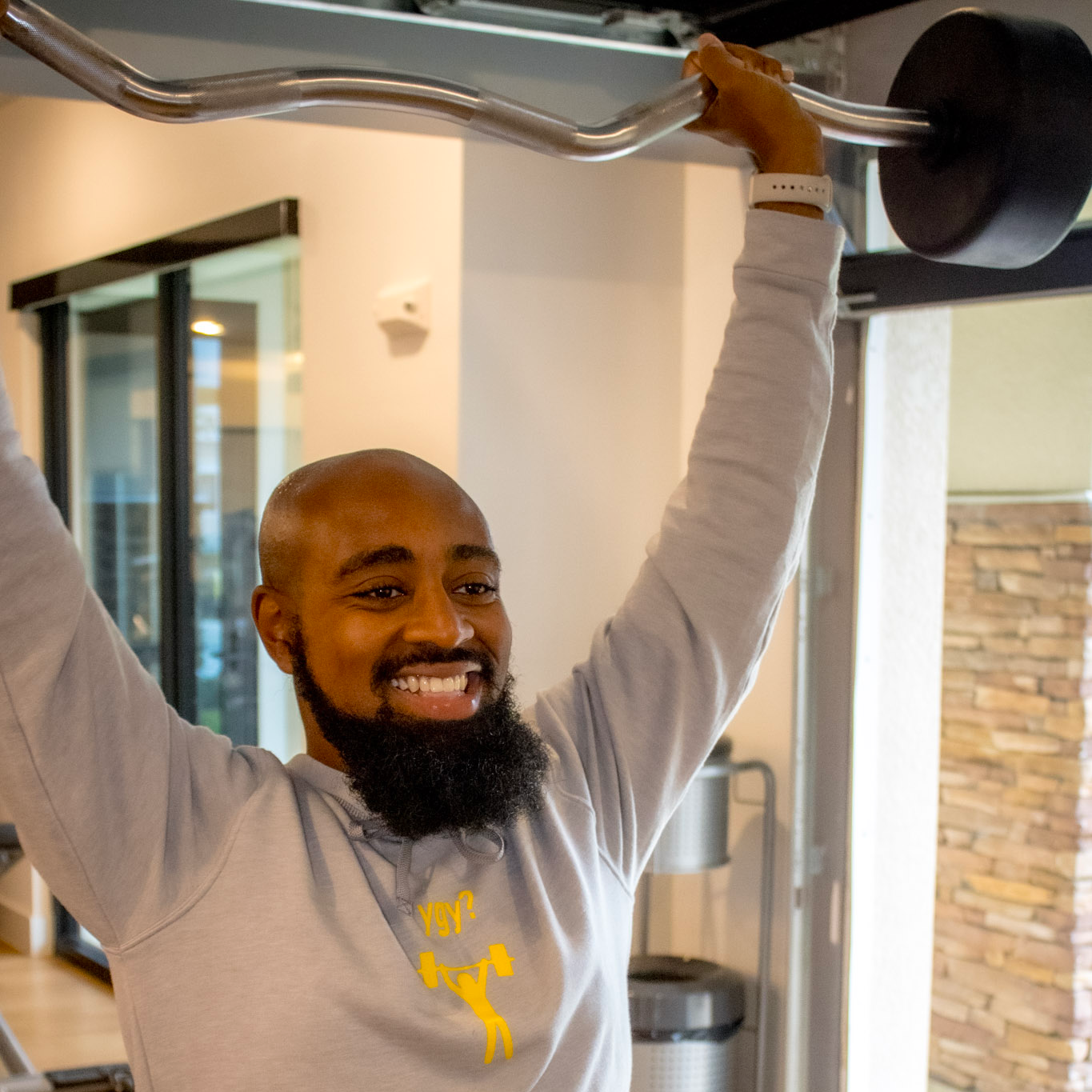 Javal performing Barbell raises